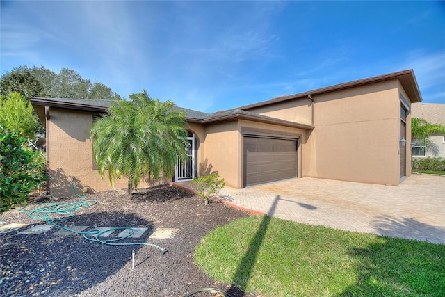 view of front of home featuring a garage