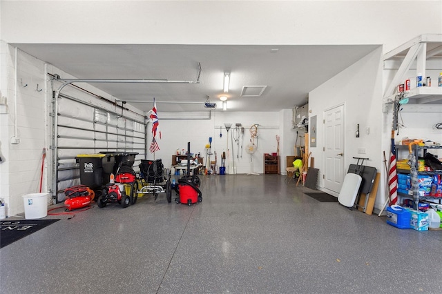 garage featuring a garage door opener