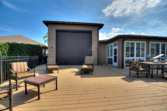 deck featuring a garage