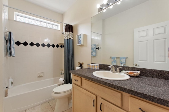 full bathroom with vanity, toilet, tile patterned floors, and shower / bath combo with shower curtain