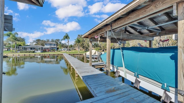 dock area featuring a water view