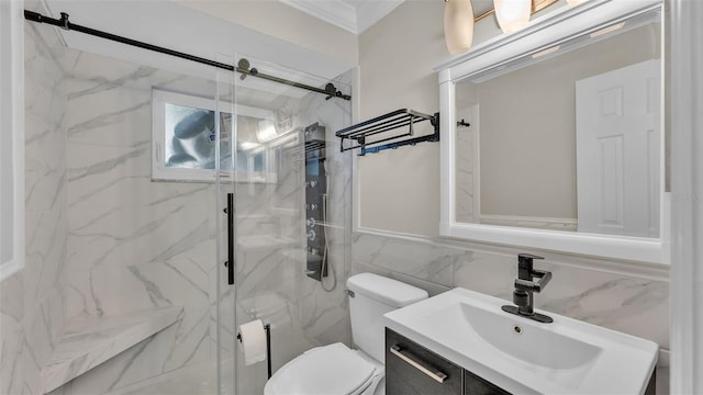 bathroom with vanity, ornamental molding, a shower with door, and tile walls