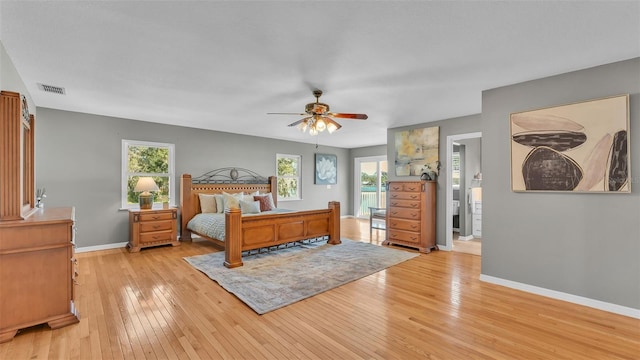 bedroom with ceiling fan and light hardwood / wood-style floors