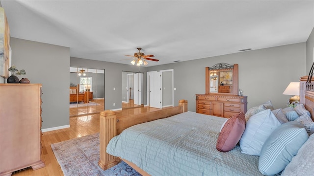 bedroom featuring ceiling fan and light wood-type flooring