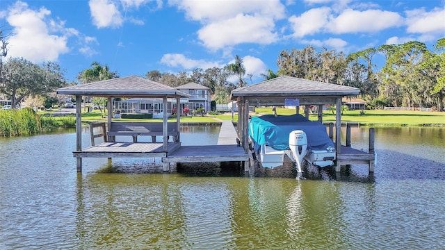 view of dock with a water view and a gazebo