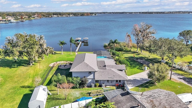 birds eye view of property featuring a water view