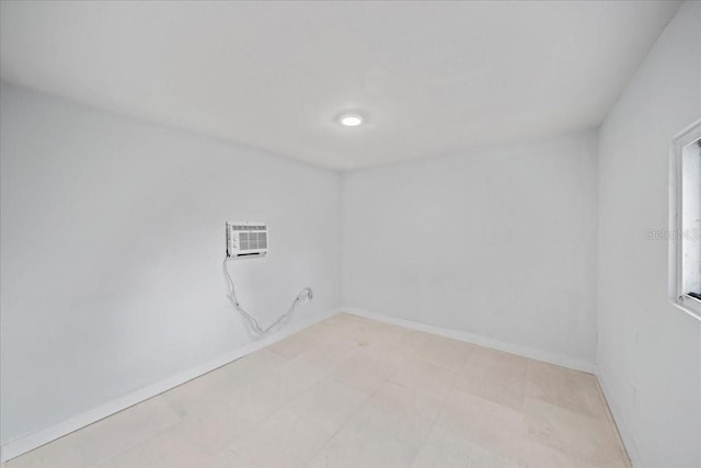 empty room featuring a wall unit AC