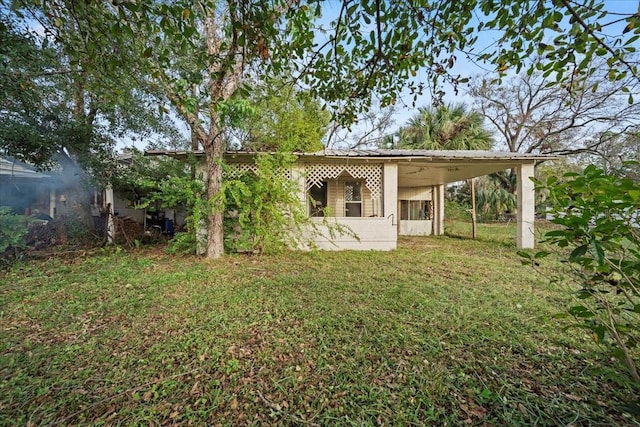 exterior space with a carport