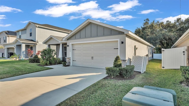 craftsman-style home featuring a front yard and a garage