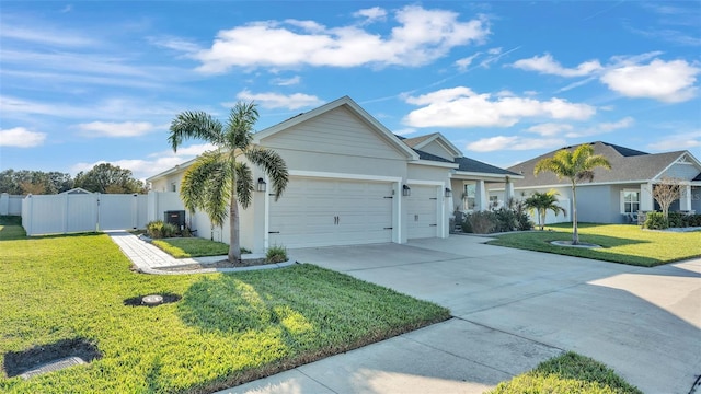 single story home with cooling unit, a garage, and a front lawn