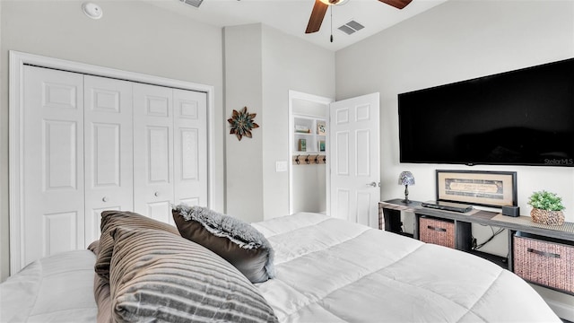 bedroom featuring ceiling fan and a closet