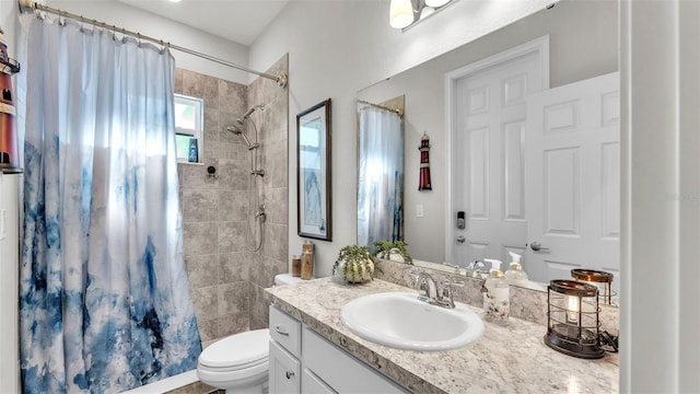 bathroom with a shower with shower curtain, vanity, and toilet