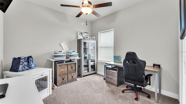 office area featuring ceiling fan and light colored carpet