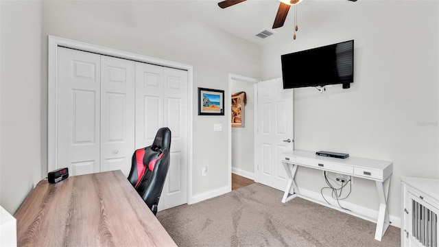 office area featuring ceiling fan and carpet floors