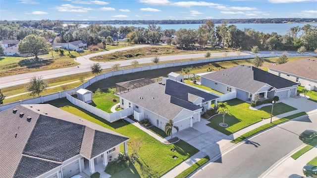 birds eye view of property featuring a water view