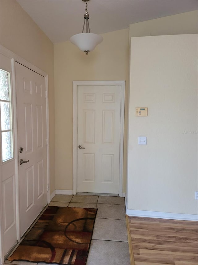 entrance foyer with light tile patterned flooring