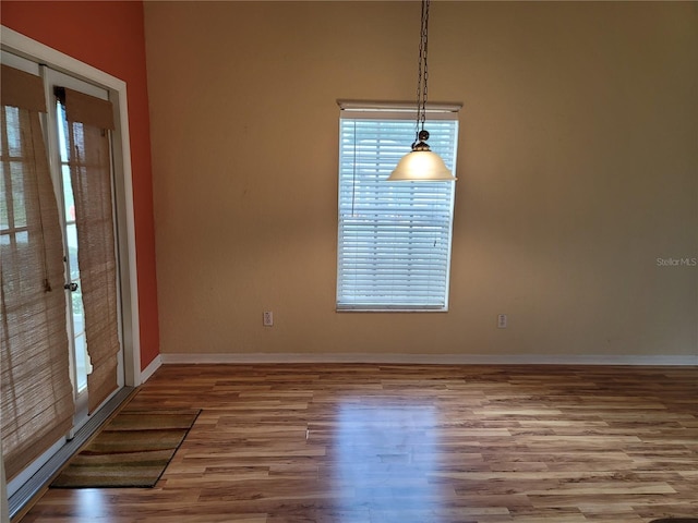 spare room featuring hardwood / wood-style flooring