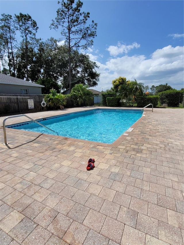 view of pool with a patio