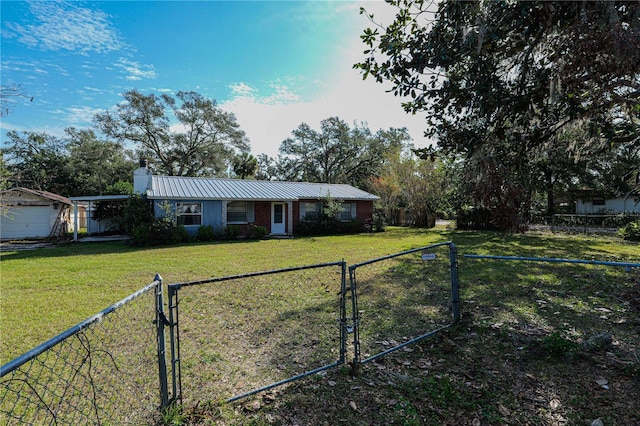 single story home with a front lawn