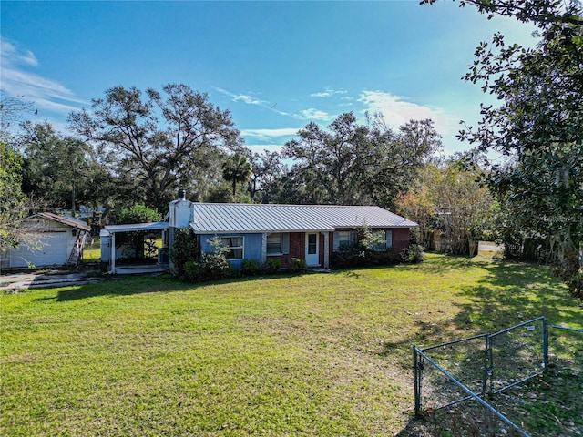 ranch-style home with a front yard and a garage