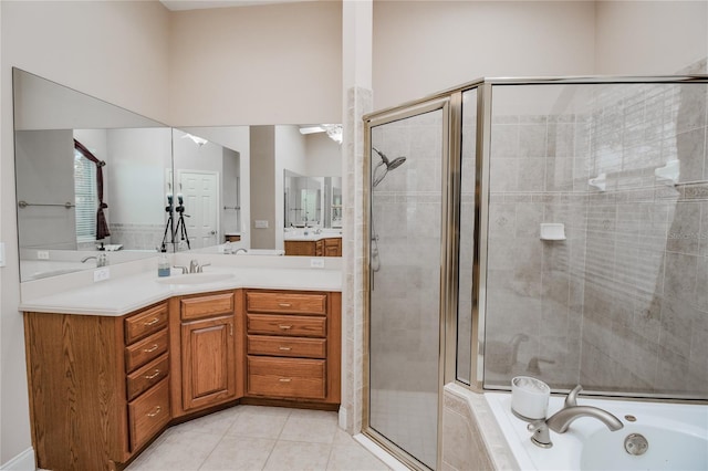 bathroom with separate shower and tub, tile patterned flooring, and vanity