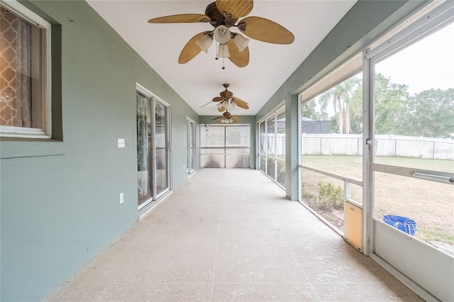 sunroom with vaulted ceiling and ceiling fan