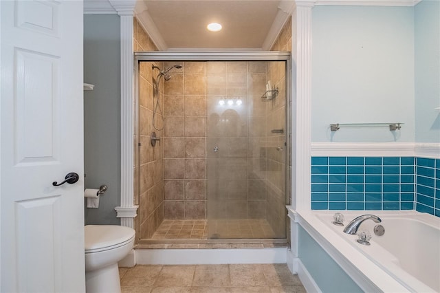 bathroom with tile patterned flooring, toilet, crown molding, and shower with separate bathtub