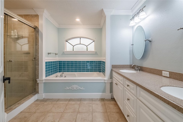 bathroom featuring tile patterned flooring, vanity, separate shower and tub, and crown molding