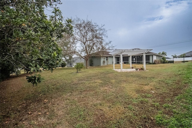 view of yard with a pergola