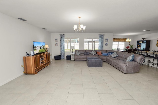 living room with an inviting chandelier