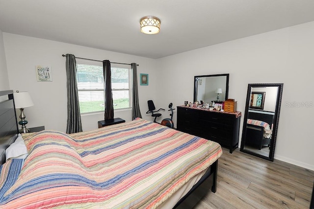 bedroom featuring light wood-type flooring