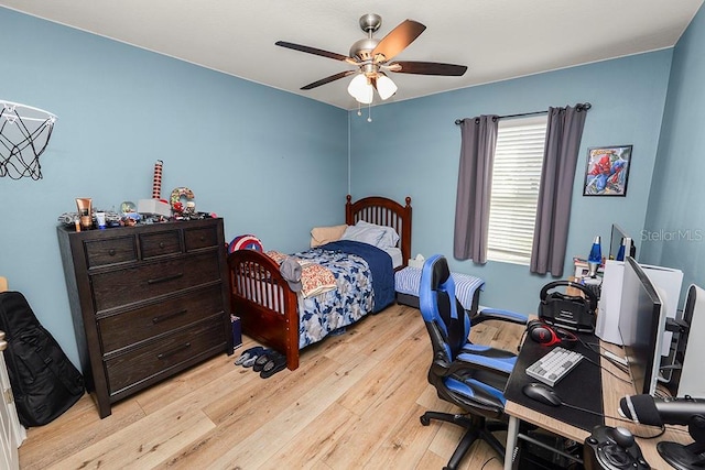 bedroom featuring ceiling fan and light wood-type flooring