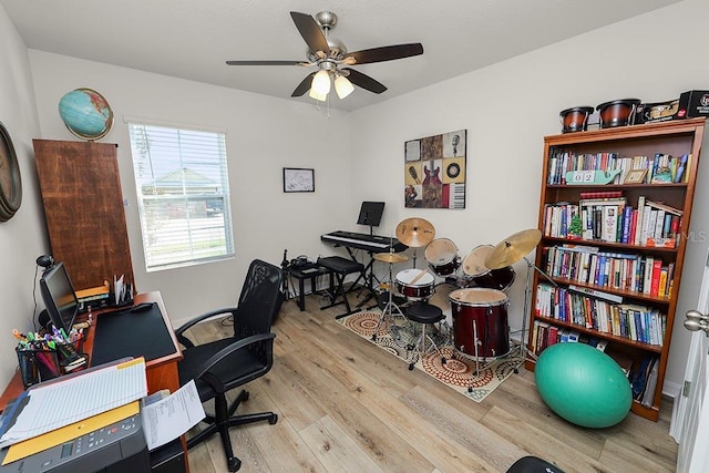 office featuring ceiling fan and light hardwood / wood-style floors