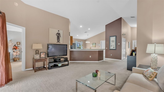 living room featuring light carpet and high vaulted ceiling