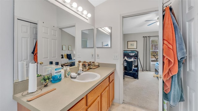 bathroom featuring vanity and ceiling fan