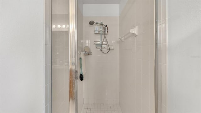 bathroom featuring an enclosed shower