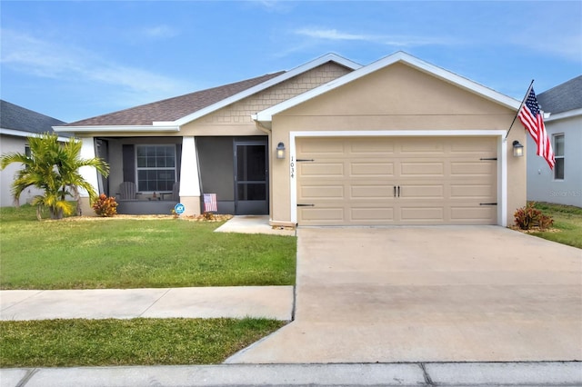 ranch-style home featuring a garage and a front lawn