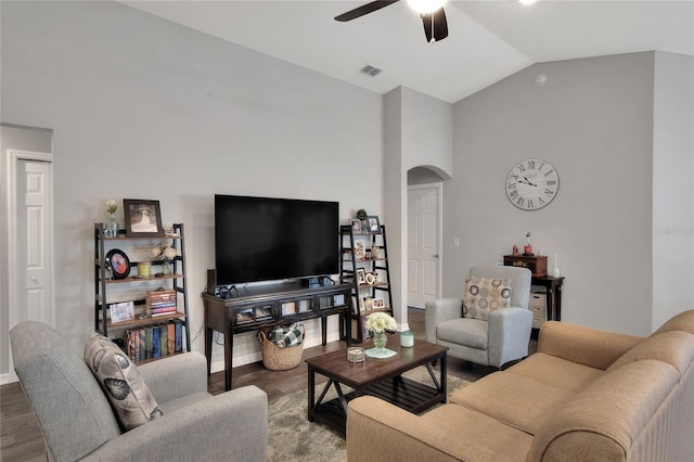 living room featuring ceiling fan, hardwood / wood-style floors, and lofted ceiling