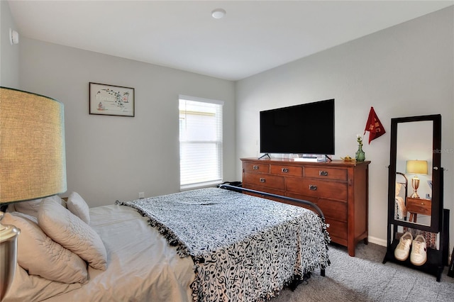 bedroom with light carpet