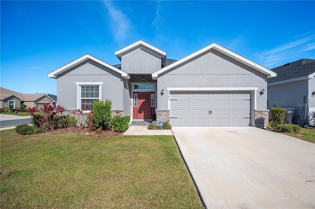 view of front of home featuring a garage and a front lawn