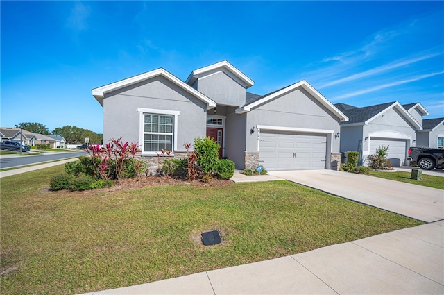 view of front facade with a garage and a front yard