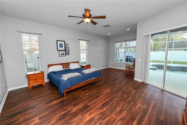 bedroom featuring access to outside, ceiling fan, and dark hardwood / wood-style flooring