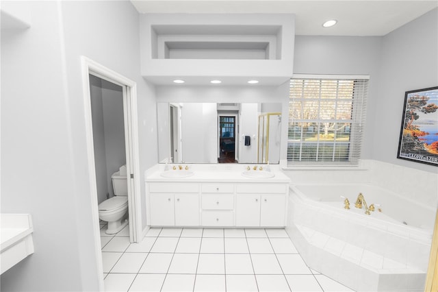 full bathroom with tile patterned floors, vanity, separate shower and tub, and toilet