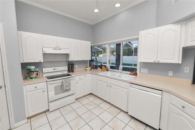 kitchen featuring white cabinetry, sink, and white appliances