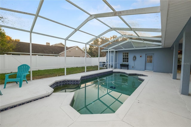 view of pool featuring a patio area and a lanai