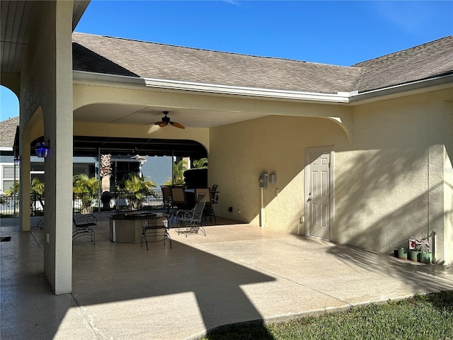 view of patio featuring ceiling fan