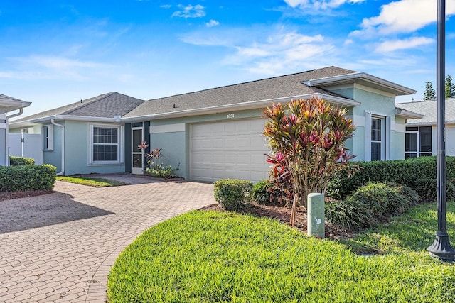 single story home with a garage