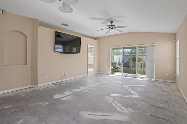 unfurnished living room with vaulted ceiling