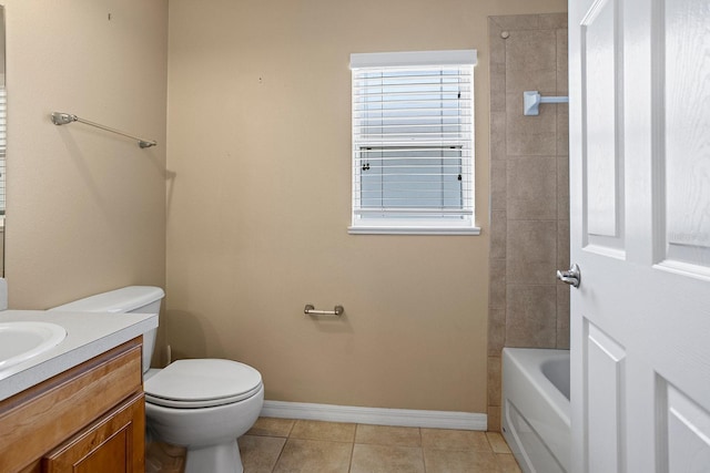 full bathroom with tile patterned flooring, vanity, toilet, and tiled shower / bath combo