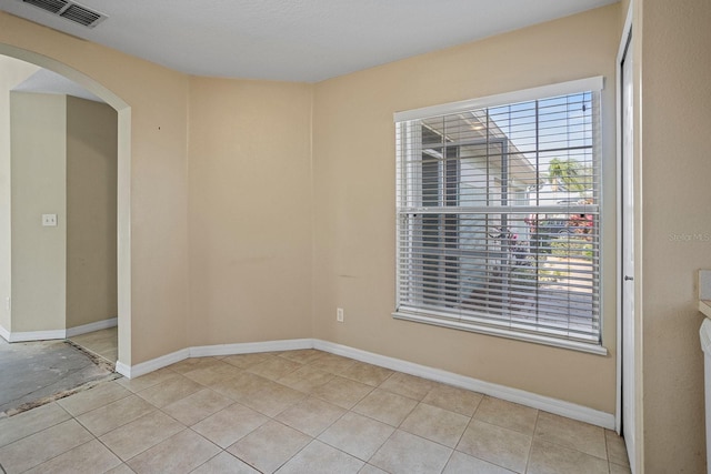 view of tiled empty room